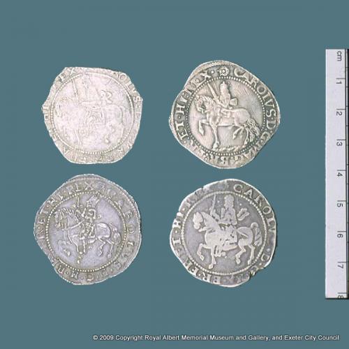 Four Exeter half crowns (obverses)
